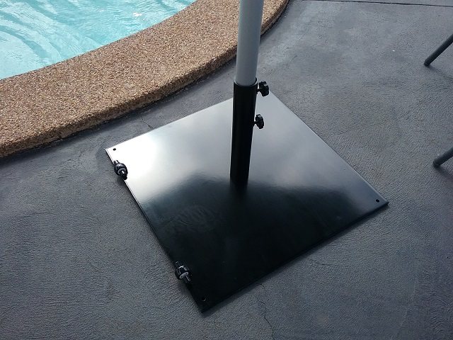 A 4.0m Octagonal SU2, in Black, with a 36kg steel base and a 3.5m Octagonal SU7, also in Black, with a surface plate installed at a property in Greystanes, NSW.